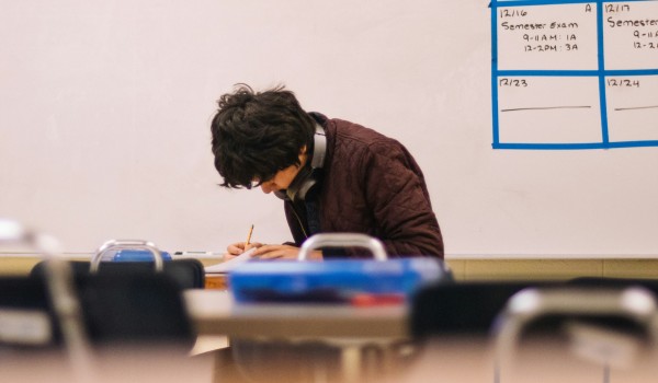 A student taking notes